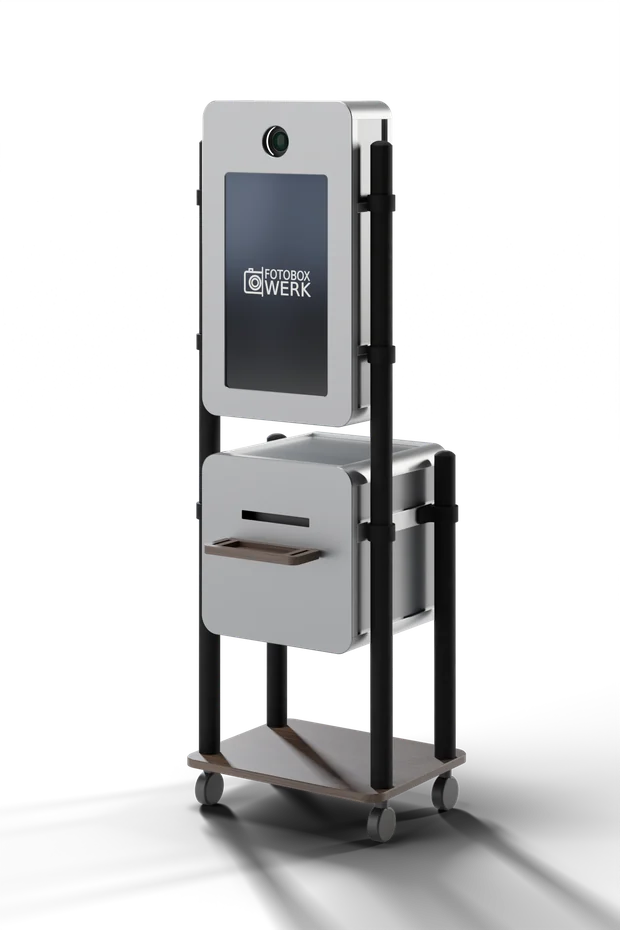 Mod. 2, Fotobox mit eingefasstem Monitor am Rohrgestell, Druckmodul darunter